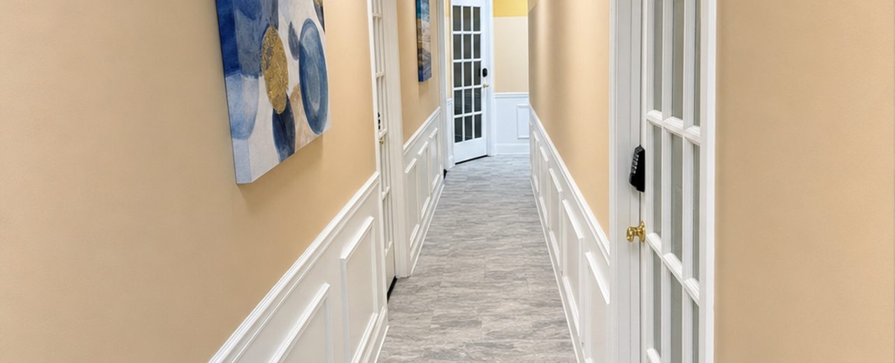 Bright second-floor hallway at the Beauty SalonBnB Bowie location